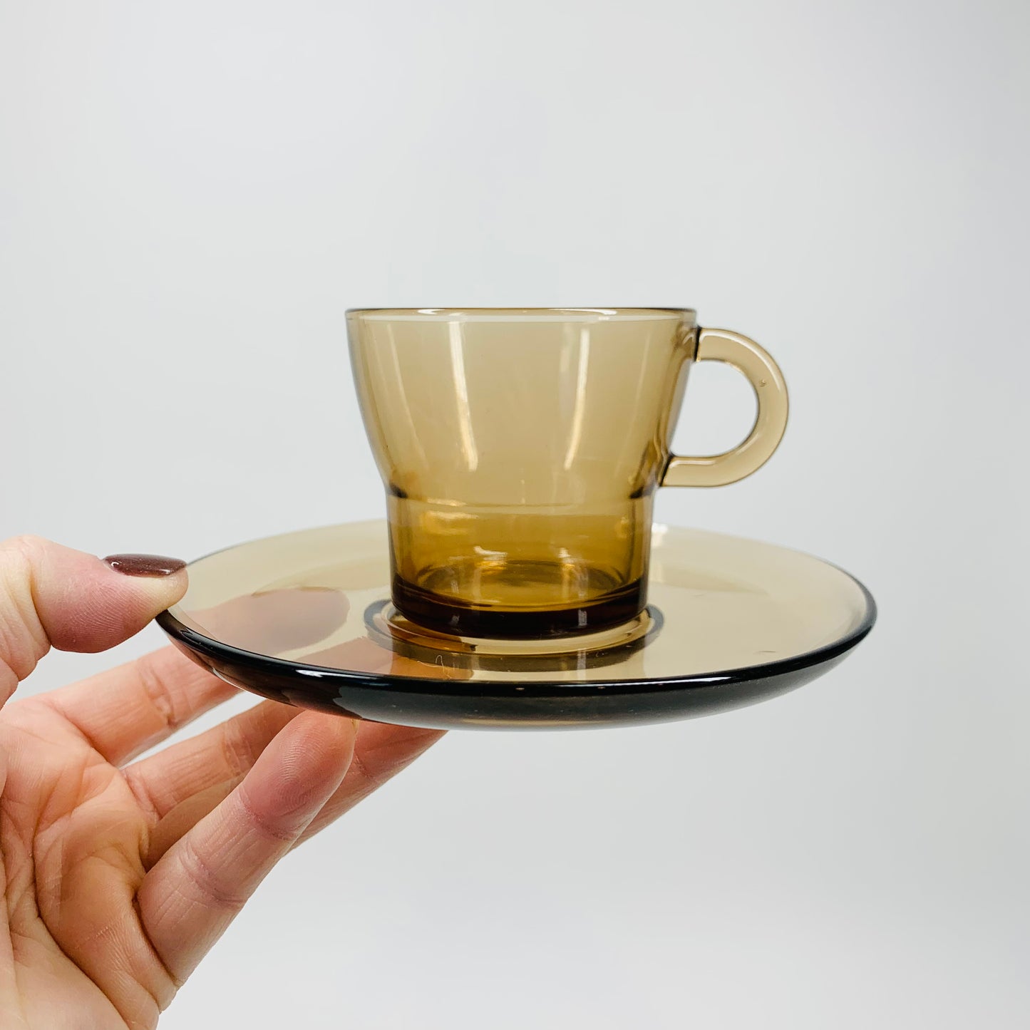 Vintage brown Duralex glass espresso cup and matching saucer