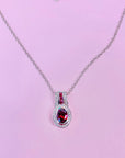 1980s 18K gold plated chain with simulated pink sapphire stones pendant