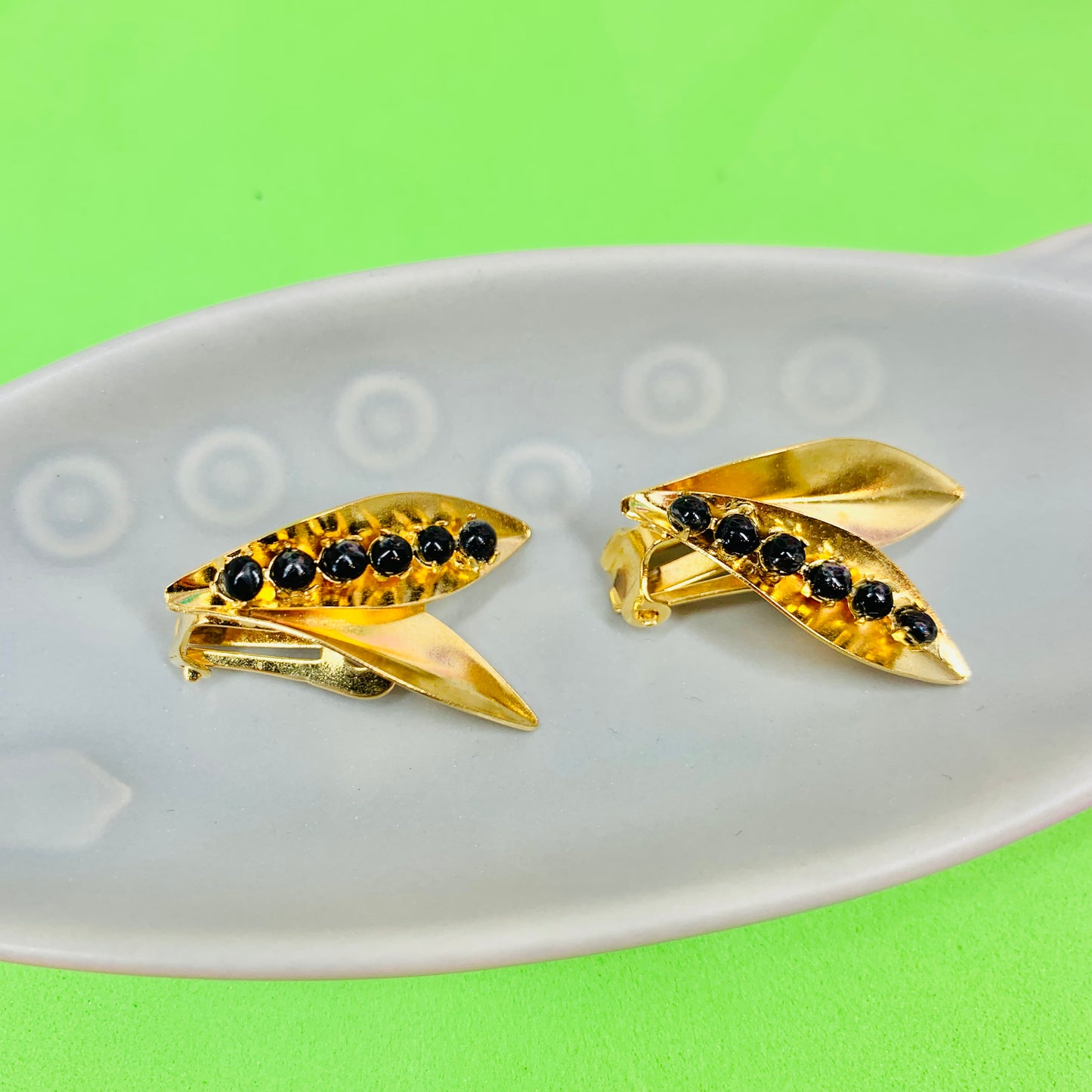 1960s brass clip on wings earrings with black beads