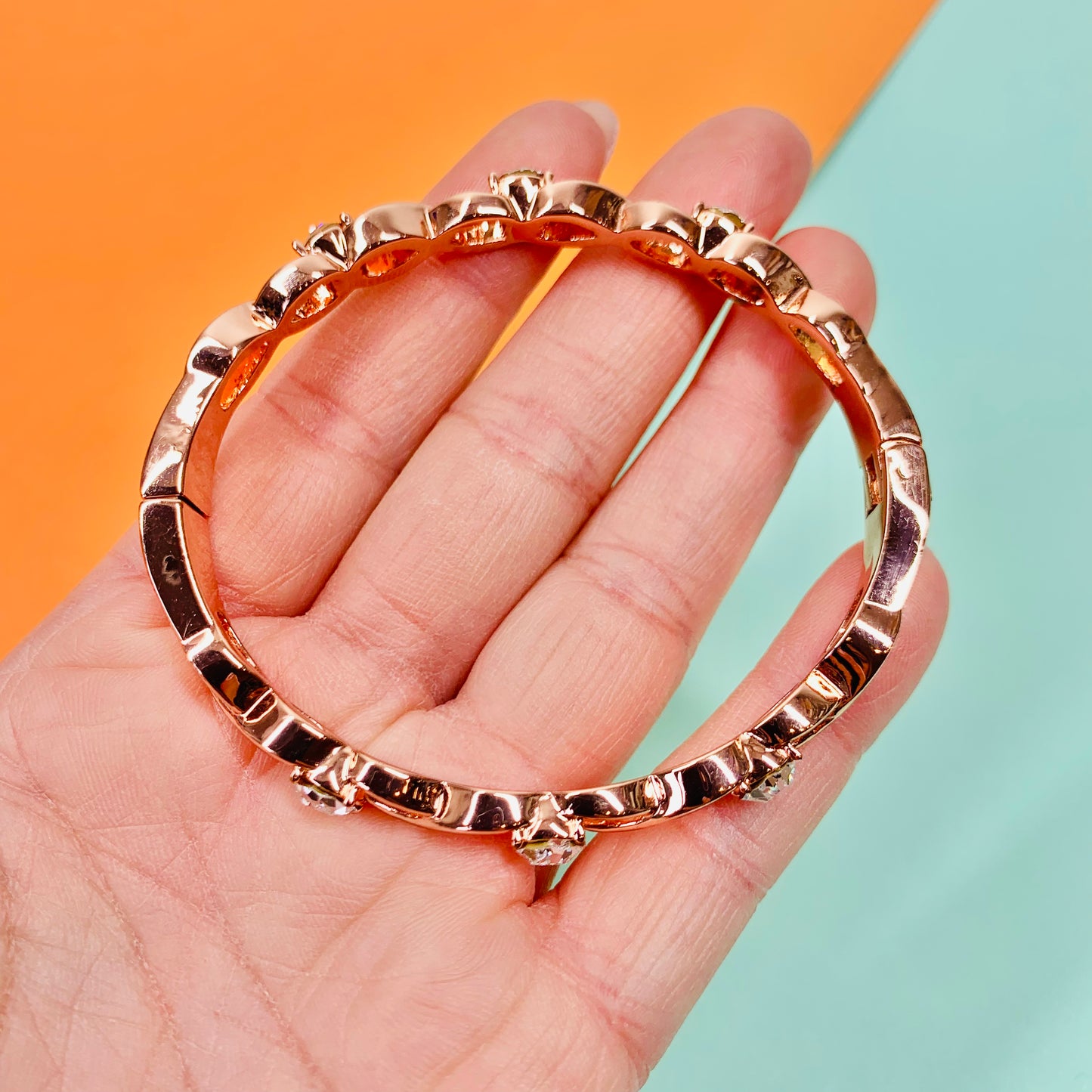 Vintage electroplated rose gold bangle with clear crystals