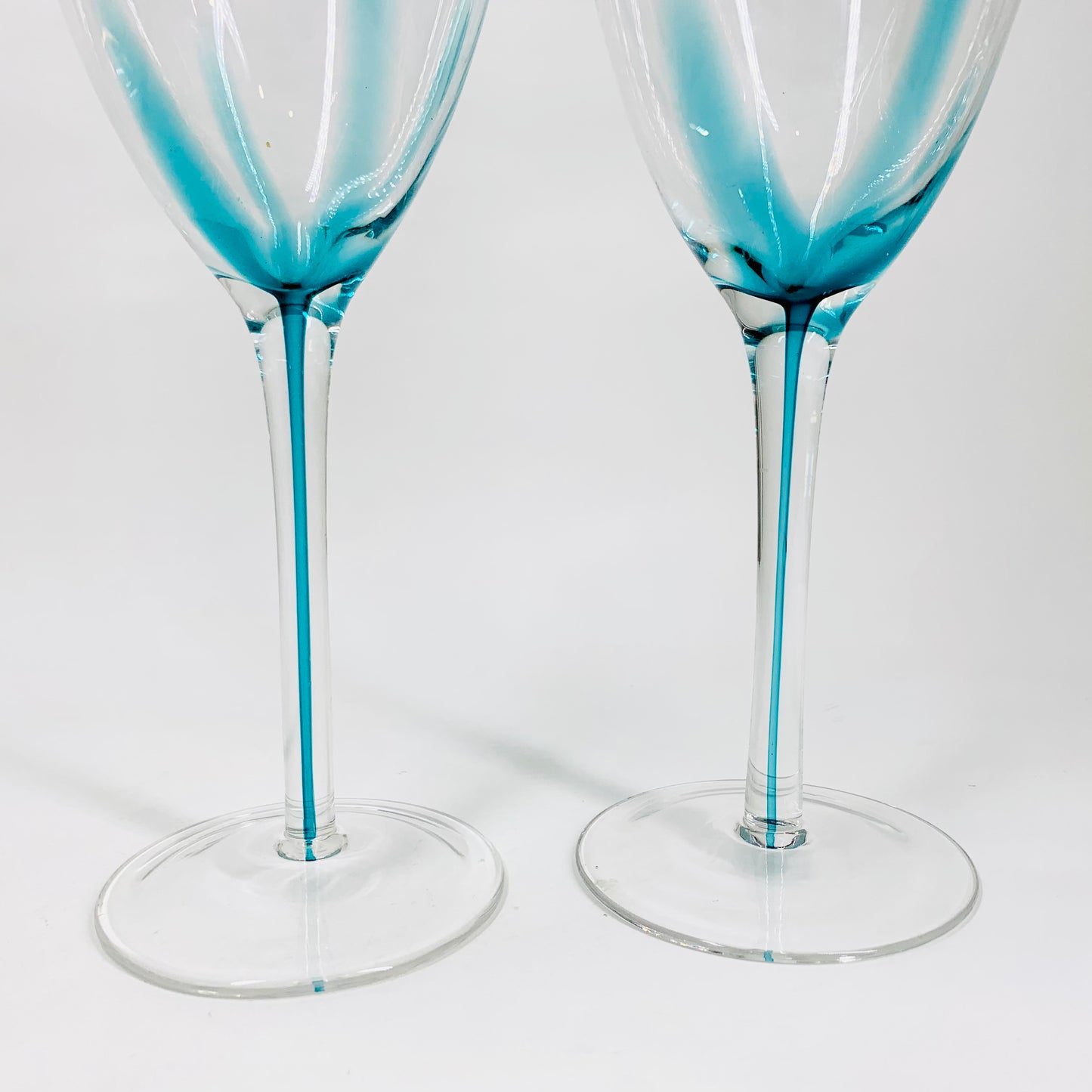 Vintage hand made turquoise art glass wine glasses with encased turquoise ink