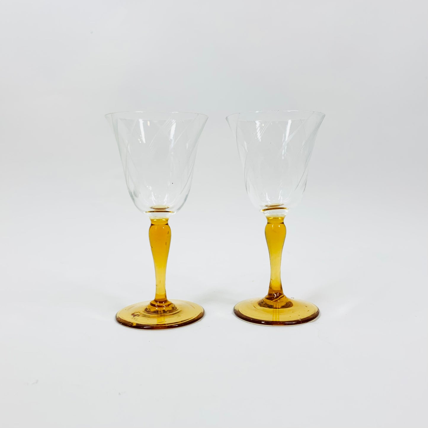 Midcentury hand etched liqueur glasses with amber stem