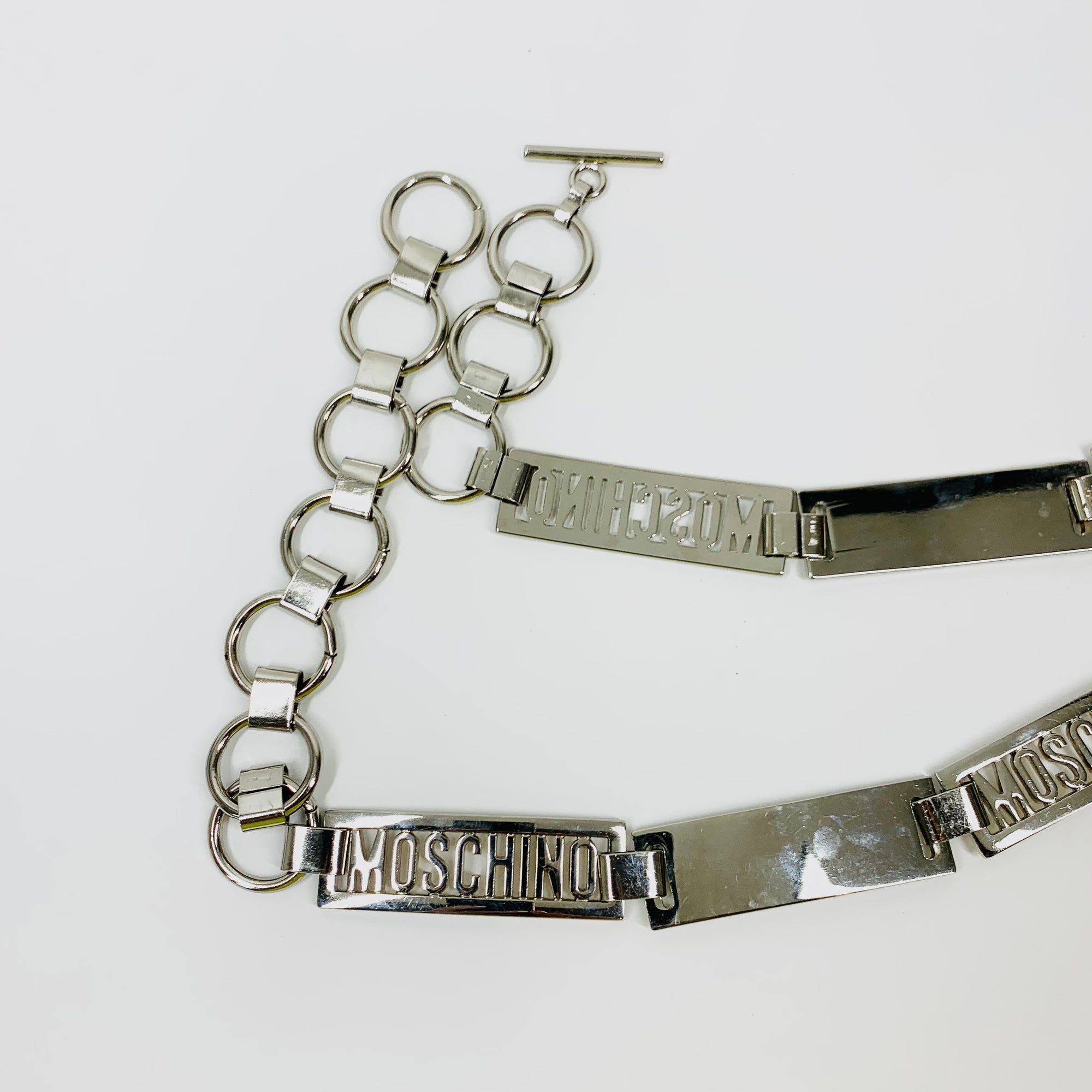 1980s MOSCHINO STAINLESS STEEL LOGO BAR BELT