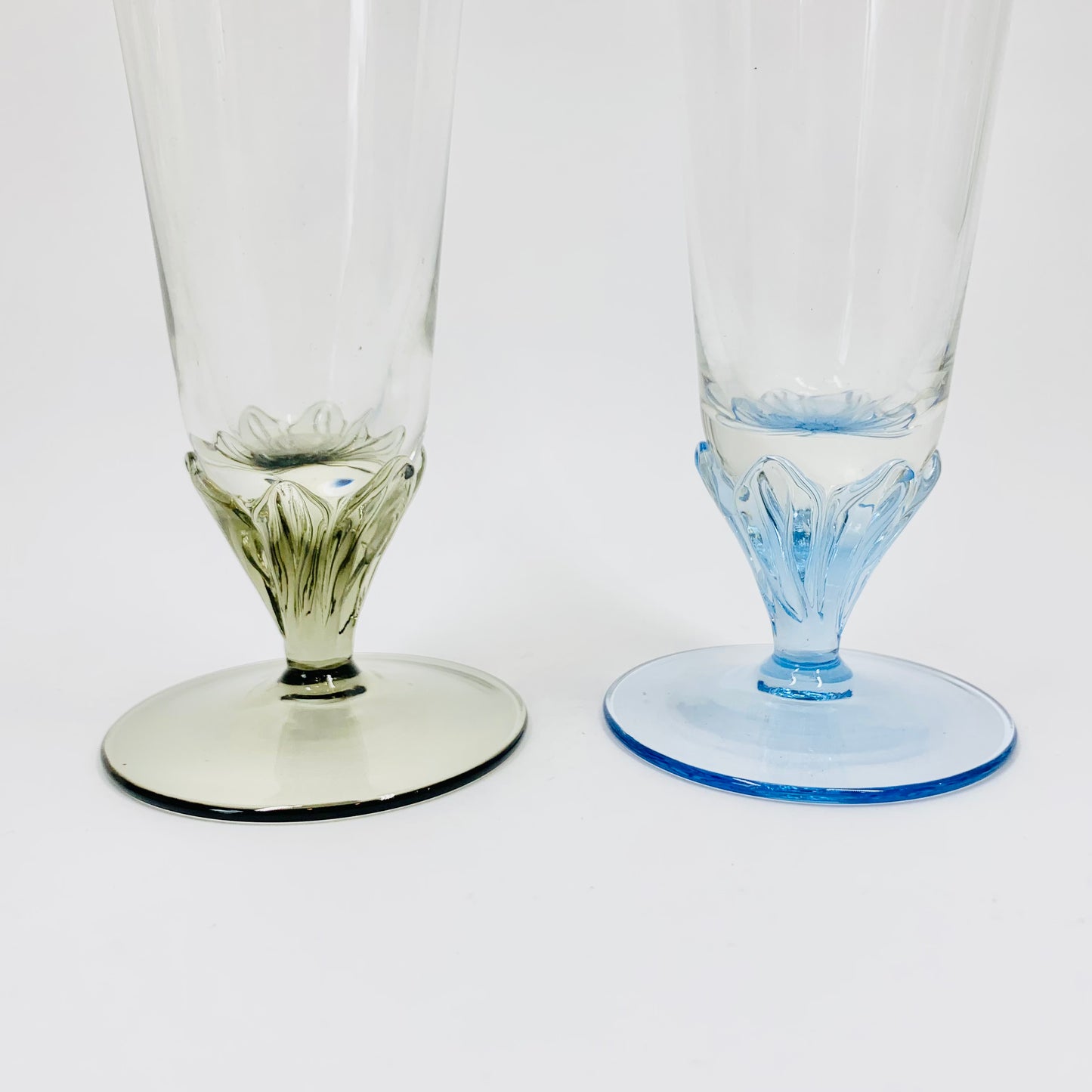 Midcentury harlequin glass champagne flutes with twist stems