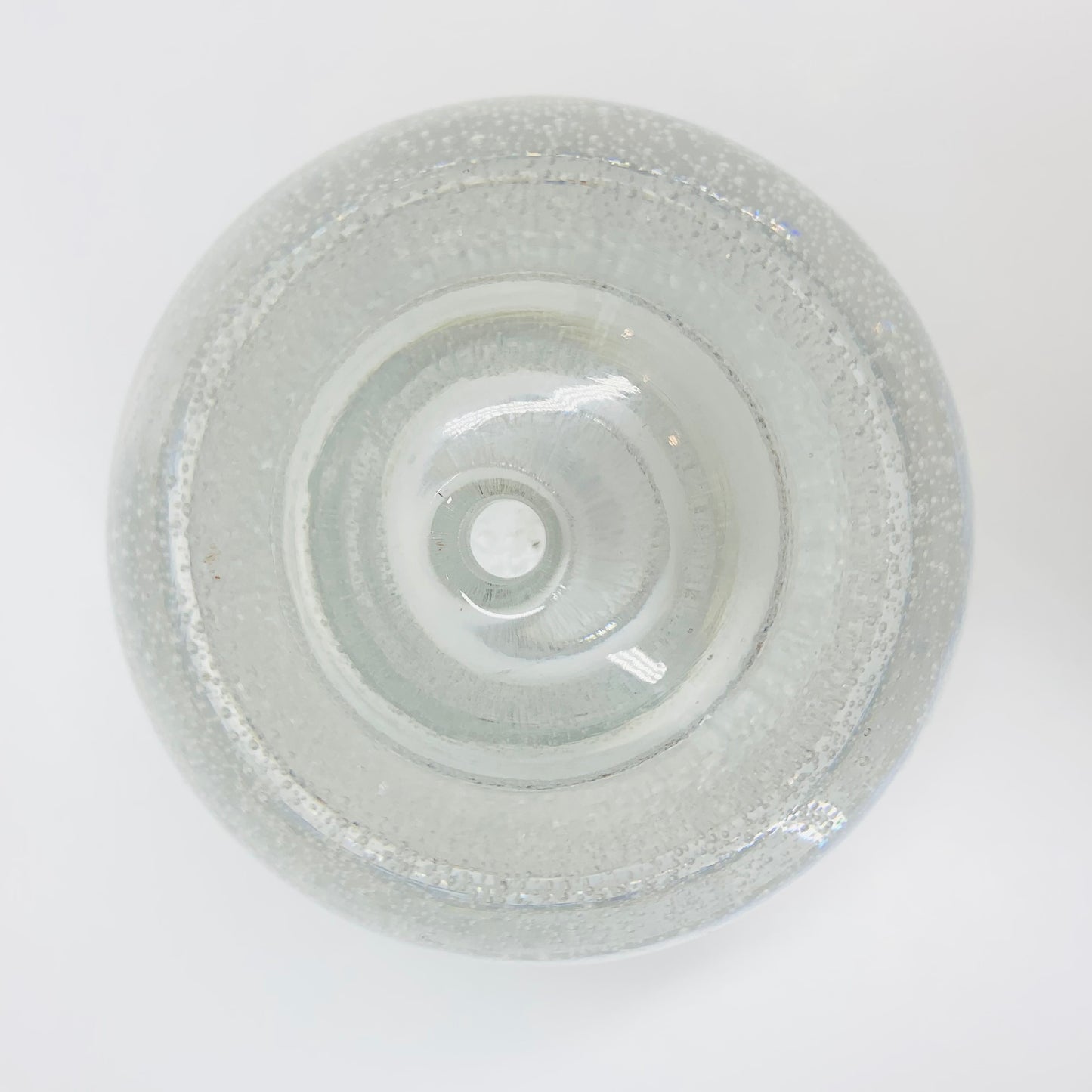 Polish glass orb with controlled bubbles