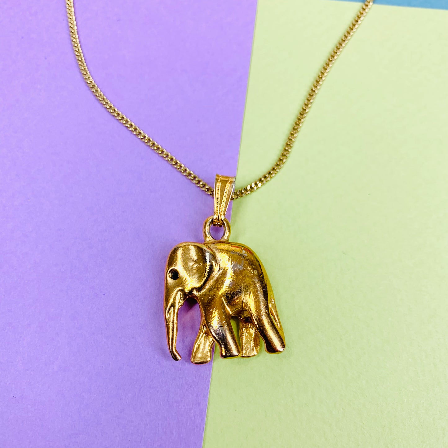 Vintage gold plated necklace with copper elephant pendant