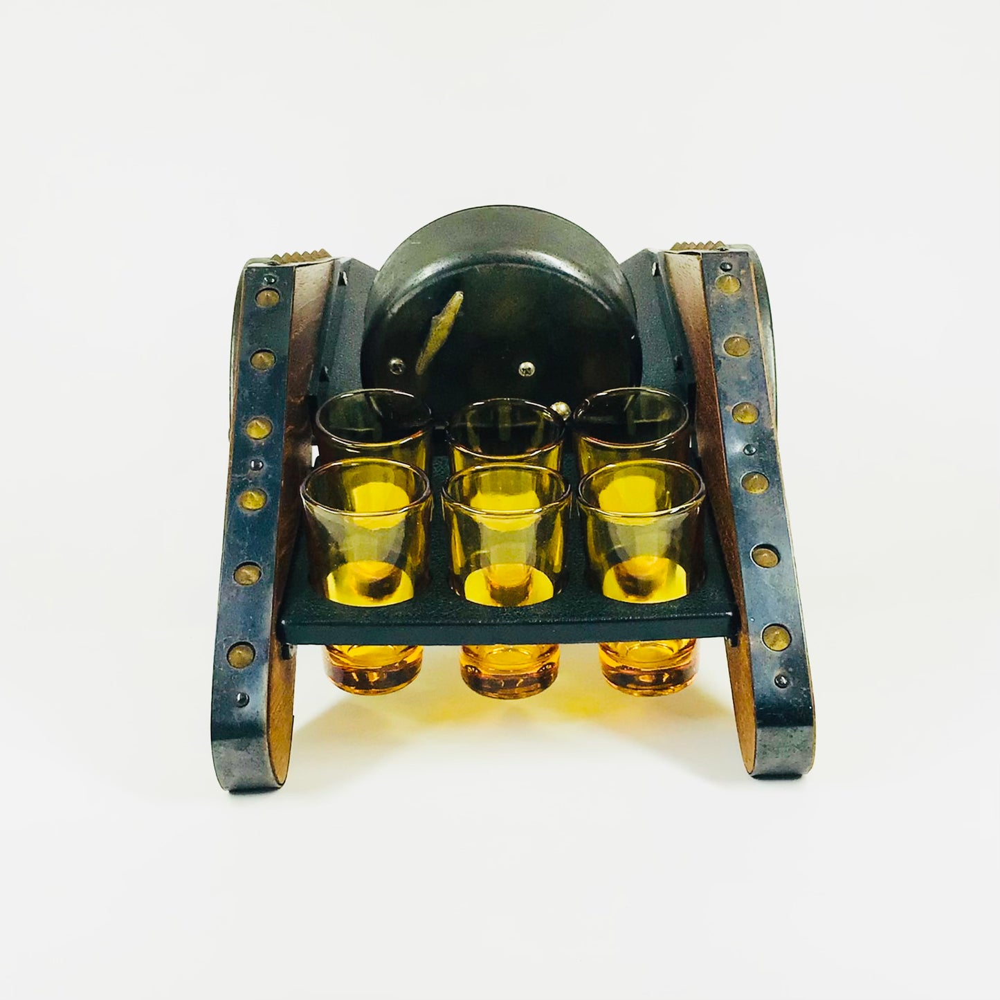 Retro wagon carrying amber shot glasses with bottle slot