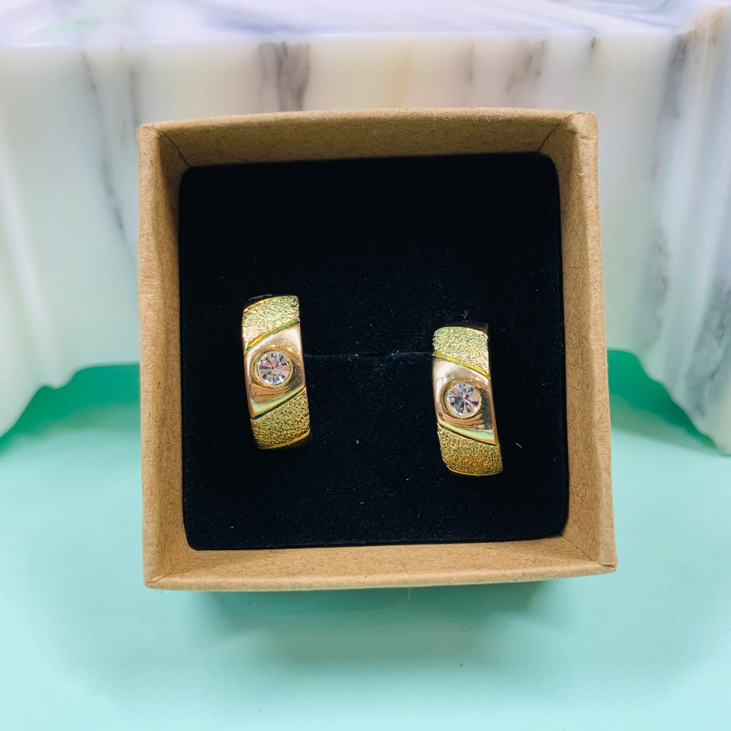 Vintage brass half hoop stud earrings with cubic zirconia