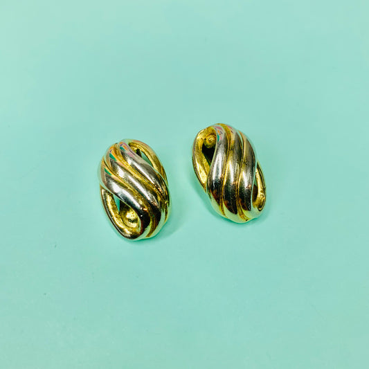 Rare 1980s triple gold plated baguette knot clip on earrings by Monet