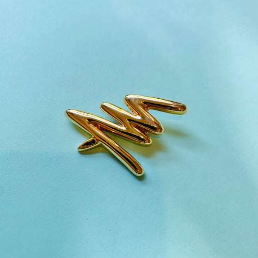 1970s gold plated waves brooch