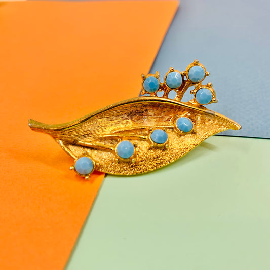 1970s plated alloy leaf brooch with turquoise beads