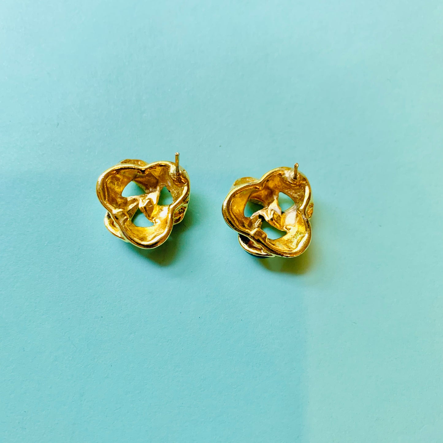 1970s Trifari gold plated navy enamel knot button stud earrings