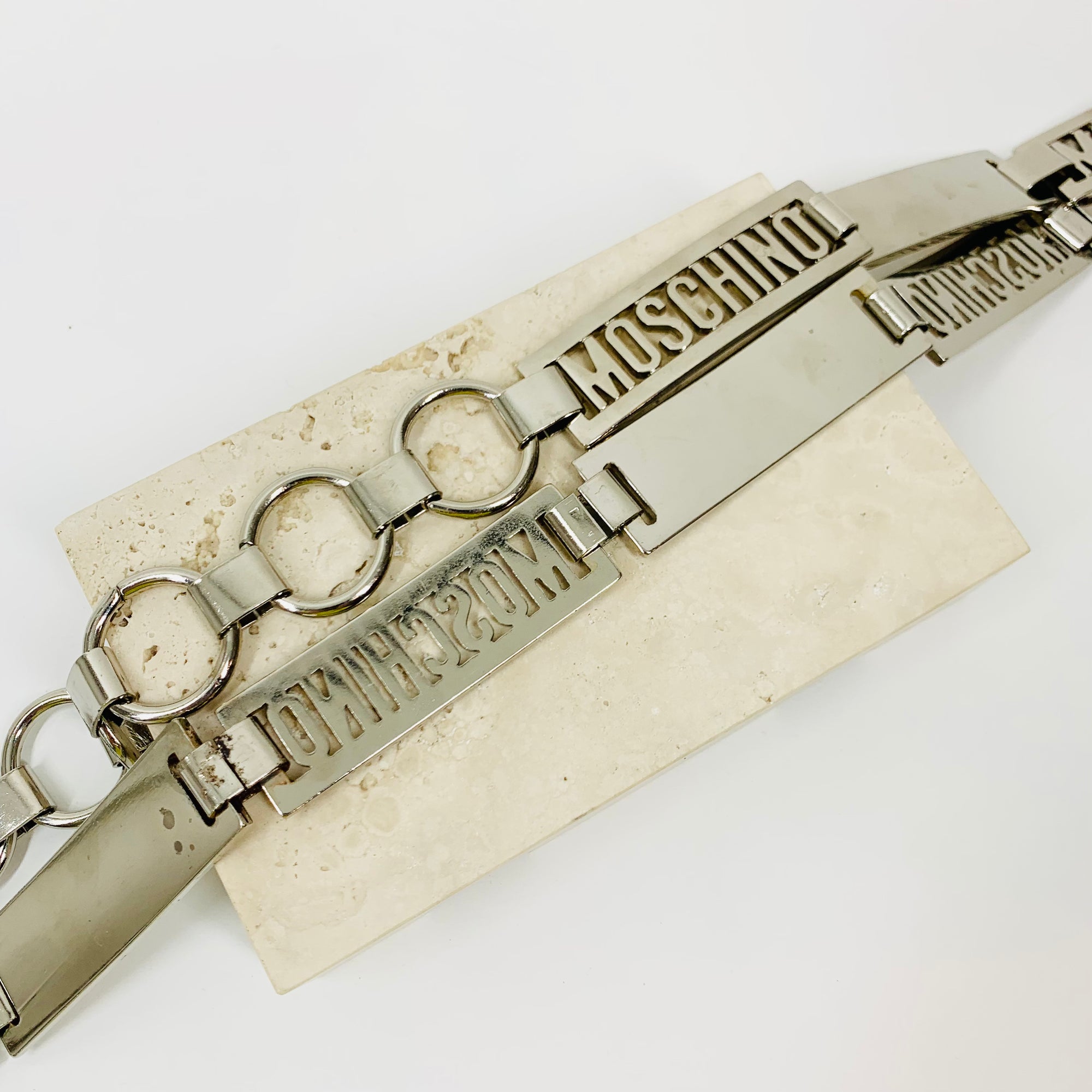 1980s MOSCHINO STAINLESS STEEL LOGO BAR BELT