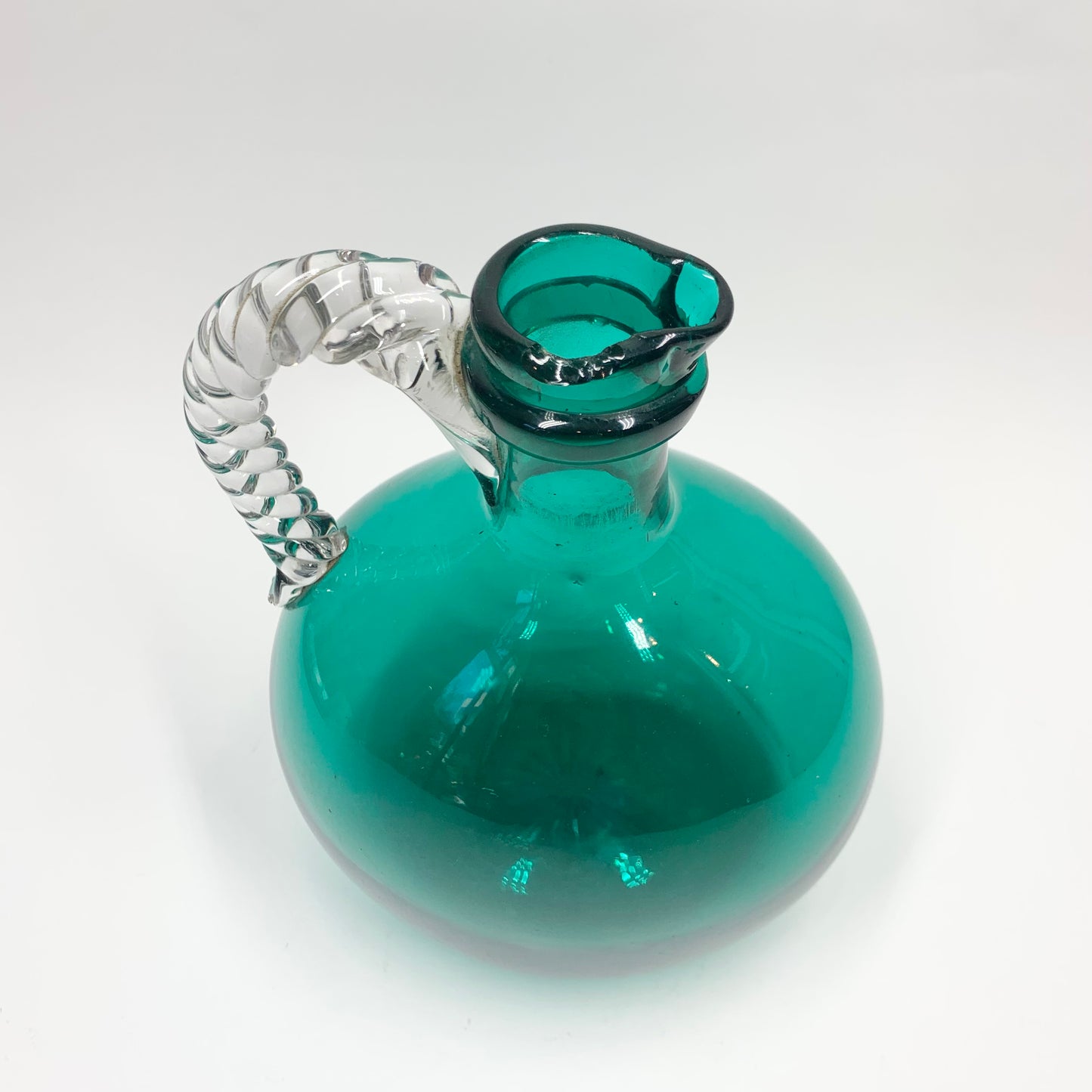 Extremely rare antique emerald green jug with twist clear glass handle