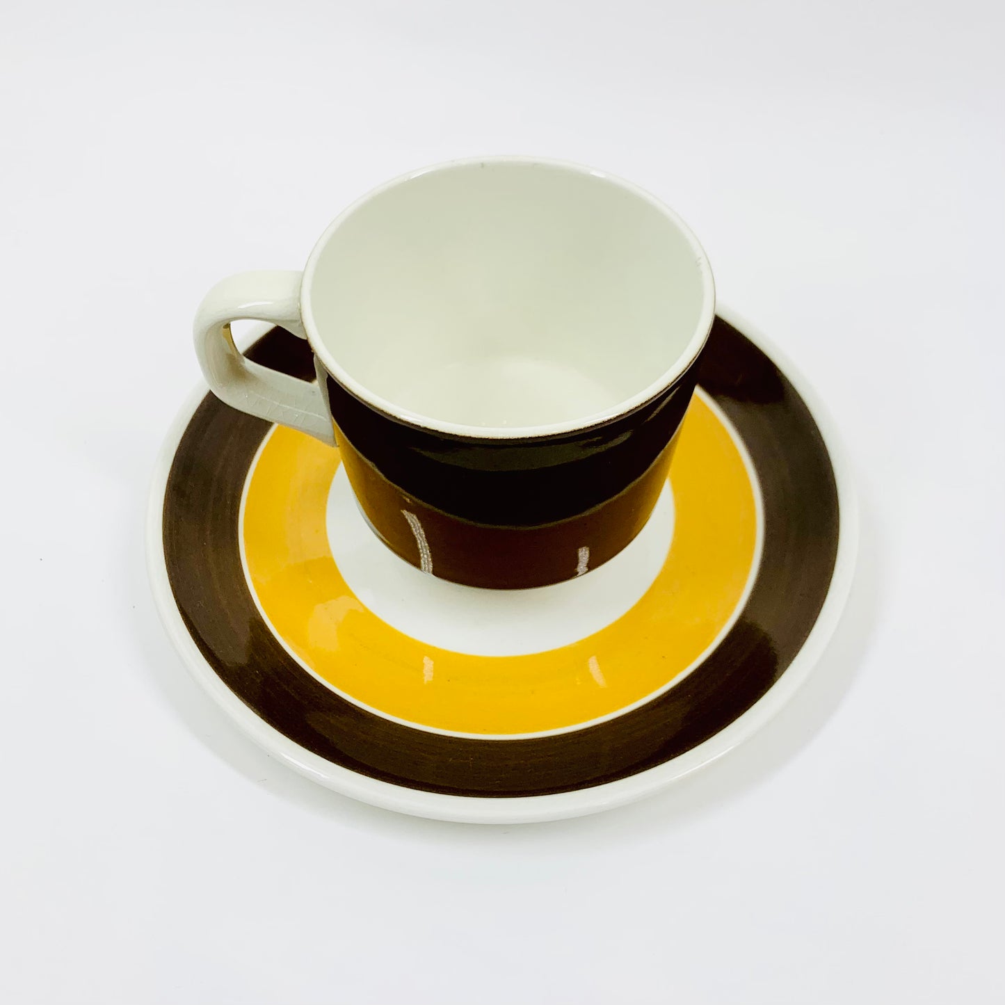 1970s brown porcelain coffee cup and matching saucer