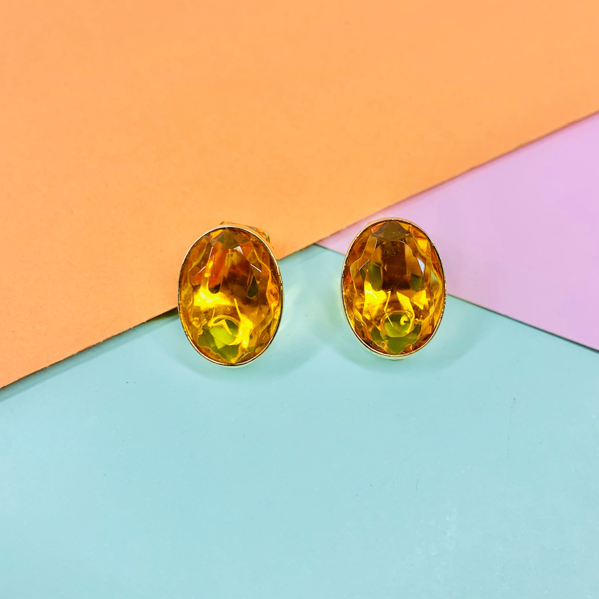 Vintage triple gold plated clip in button earrings with amber rhinestone by Pierre Lang