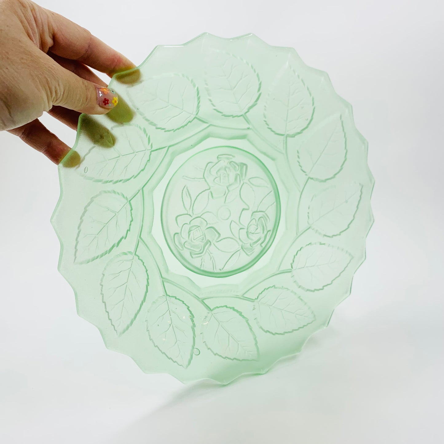 Antique uranium glass plate with leaves motif