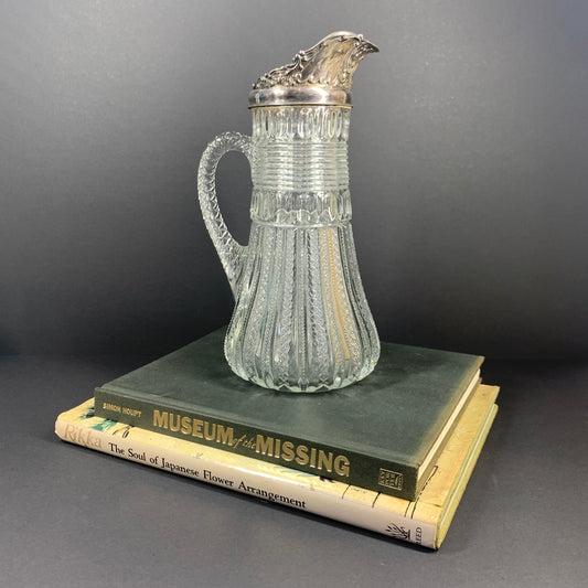 Antique pressed glass jug