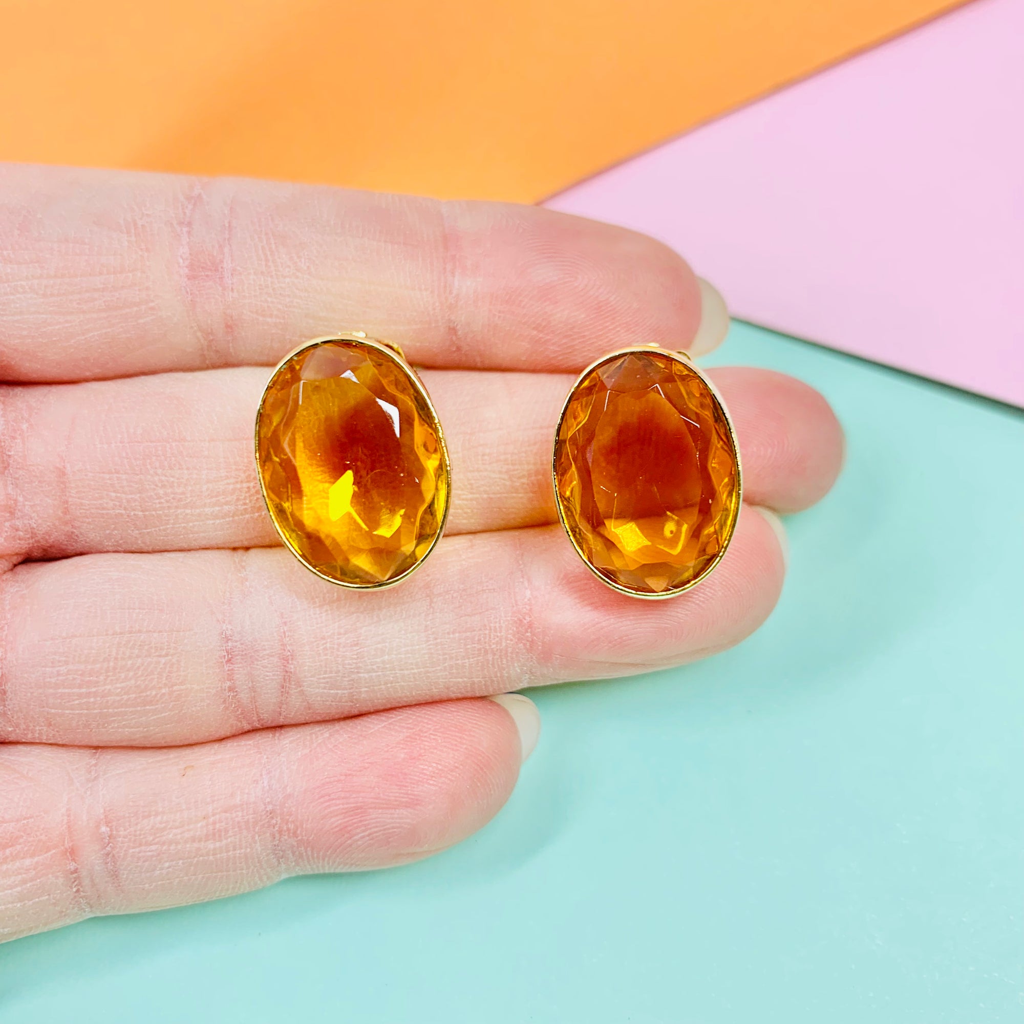 Vintage triple gold plated clip in button earrings with amber rhinestone by Pierre Lang