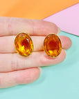 Vintage triple gold plated clip in button earrings with amber rhinestone by Pierre Lang