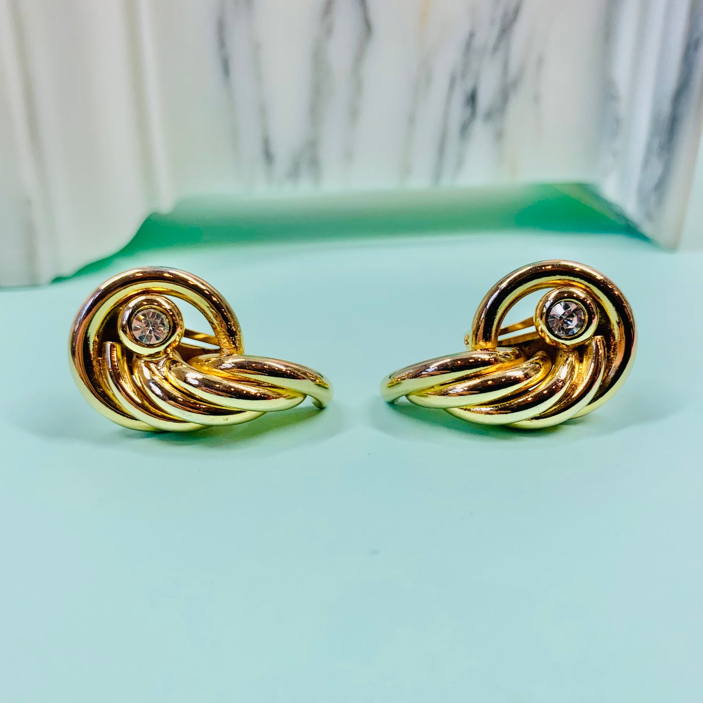 Rare 1980s triple gold plated wings earrings by Monet