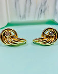 Rare 1980s triple gold plated wings earrings by Monet