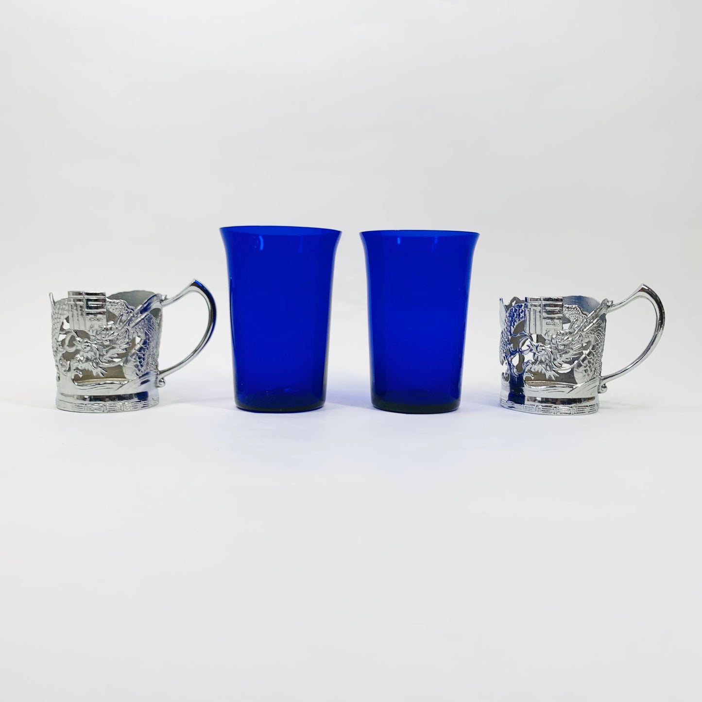 Midcentury Chinese cobalt blue glasses with silver plated sleeves