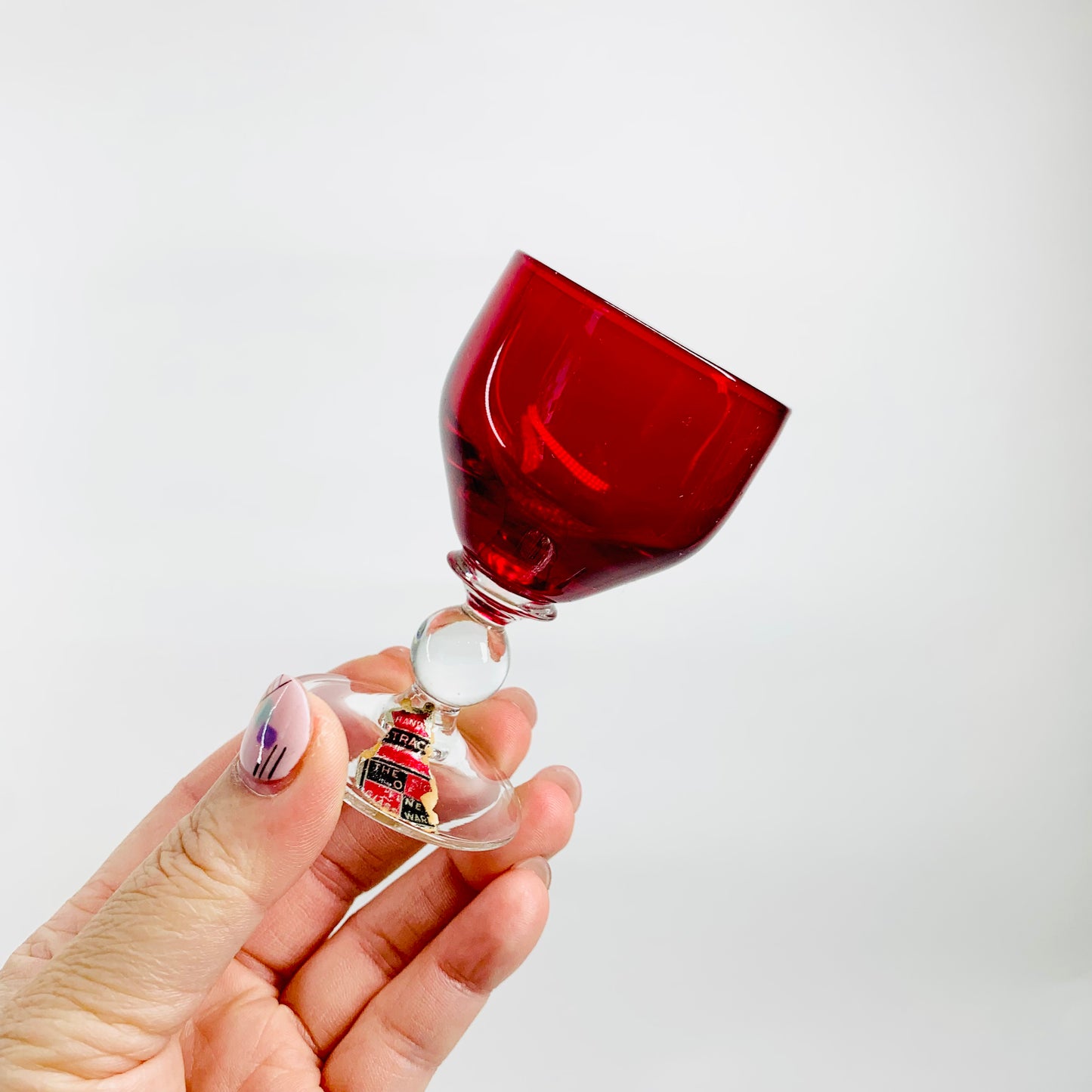 1950s ASTRACOKOUR RUBY FOOTED SHOT GLASSES