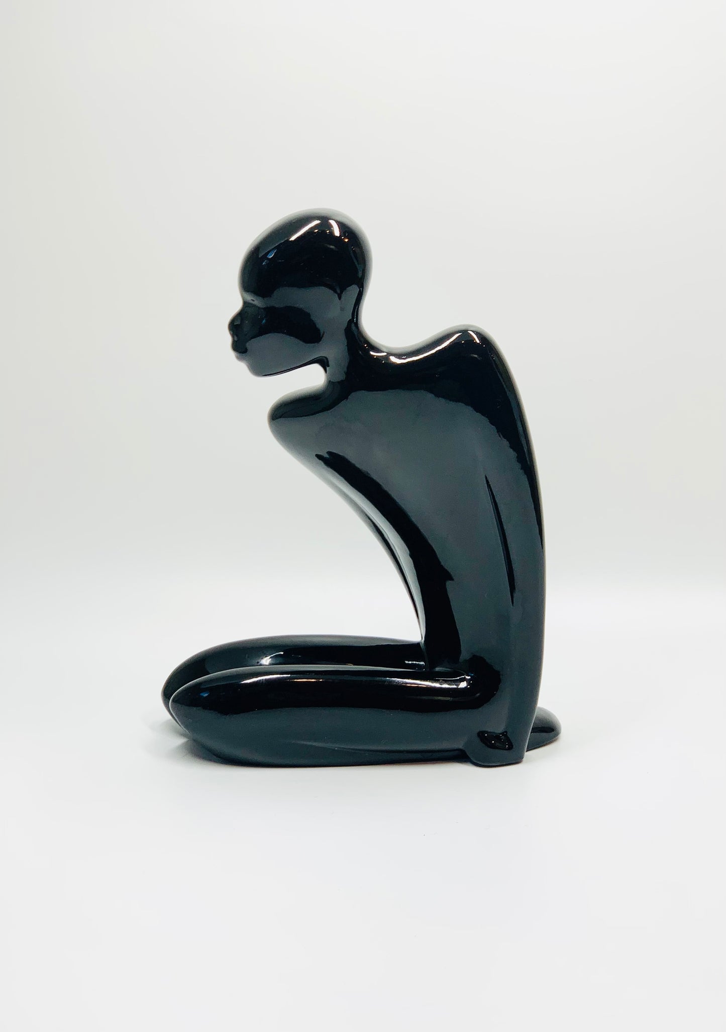 Midcentury black porcelain figurine