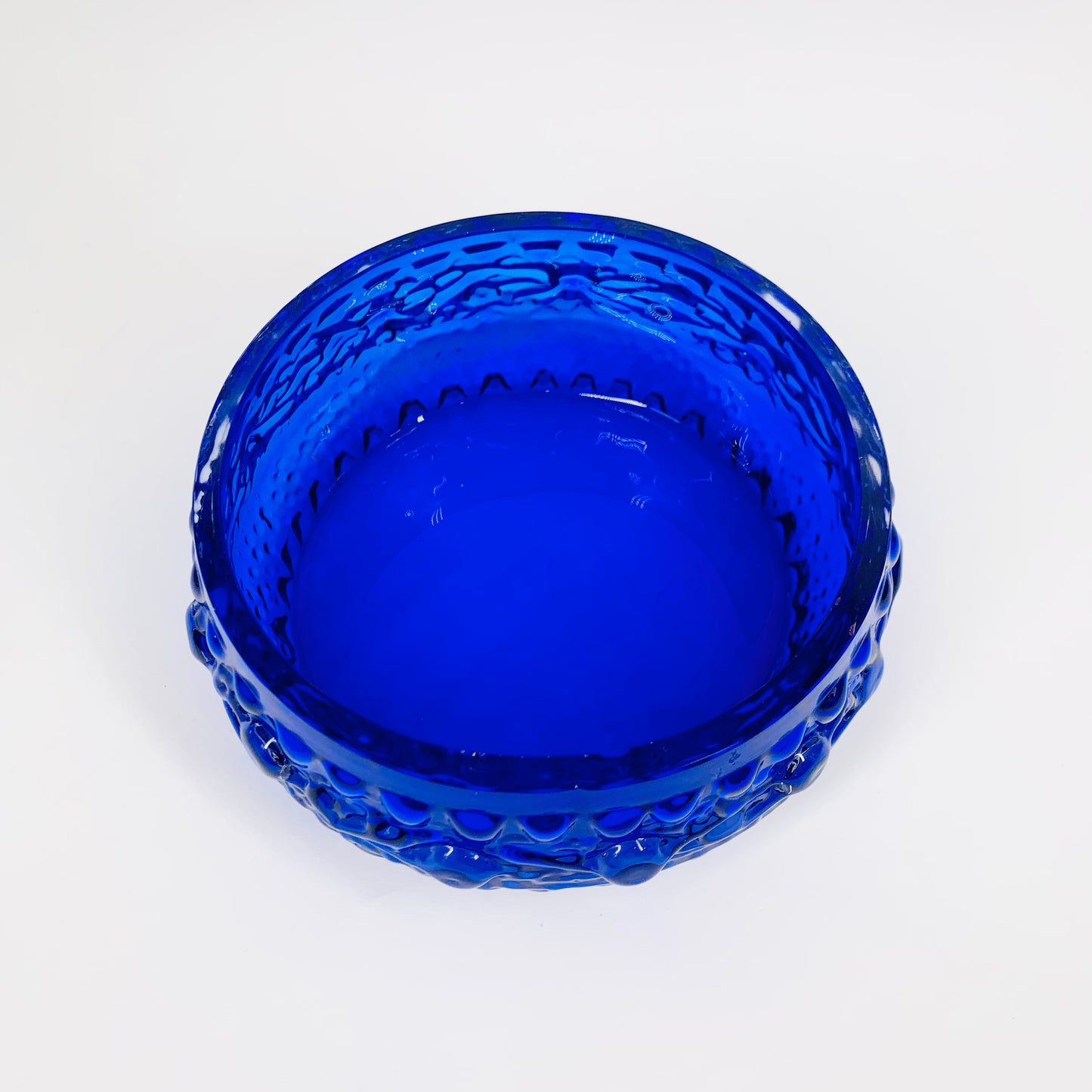 Midcentury Finnish cobalt blue glass bowl by Tamara Aladin with relief
