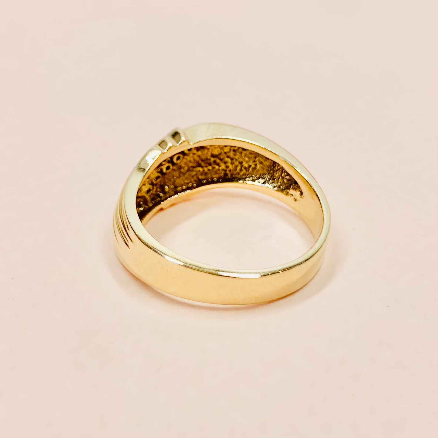 1970s 10K gold ring set with channel diamonds