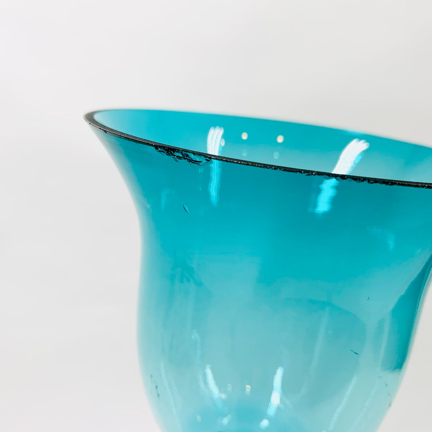 Vintage turquoise glass footed vase/candle holder