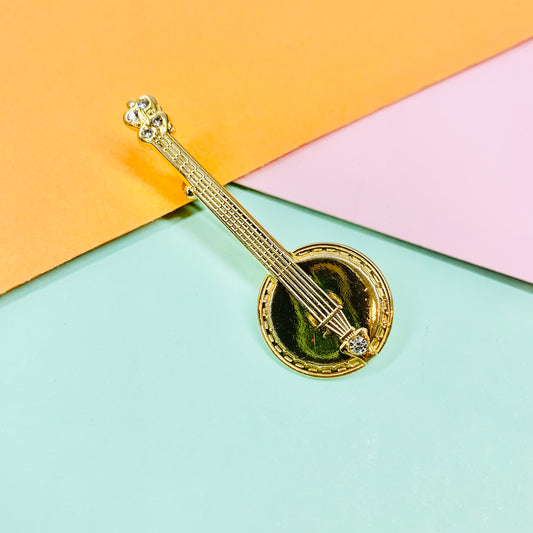 Rare 1950s gold plated banjo brooch with rhinestone