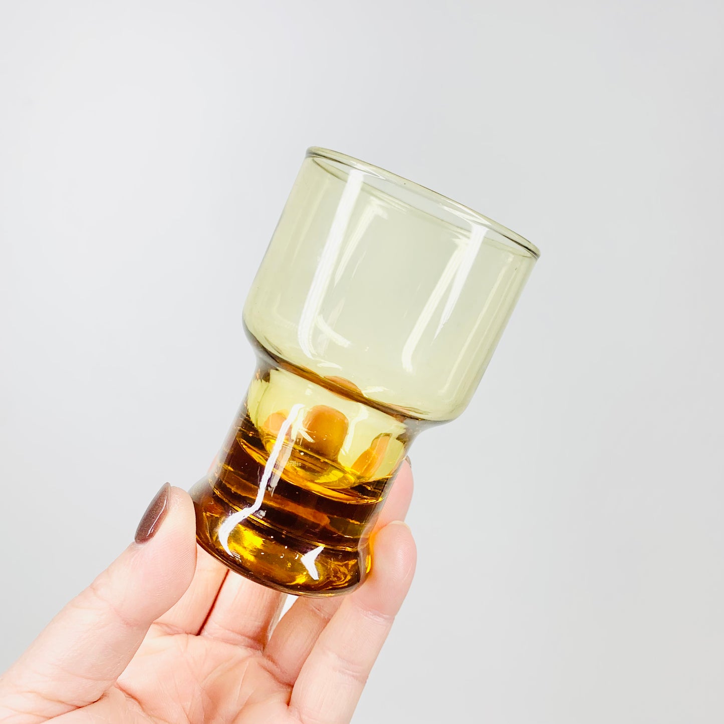MCM amber shot glasses with paperweight base