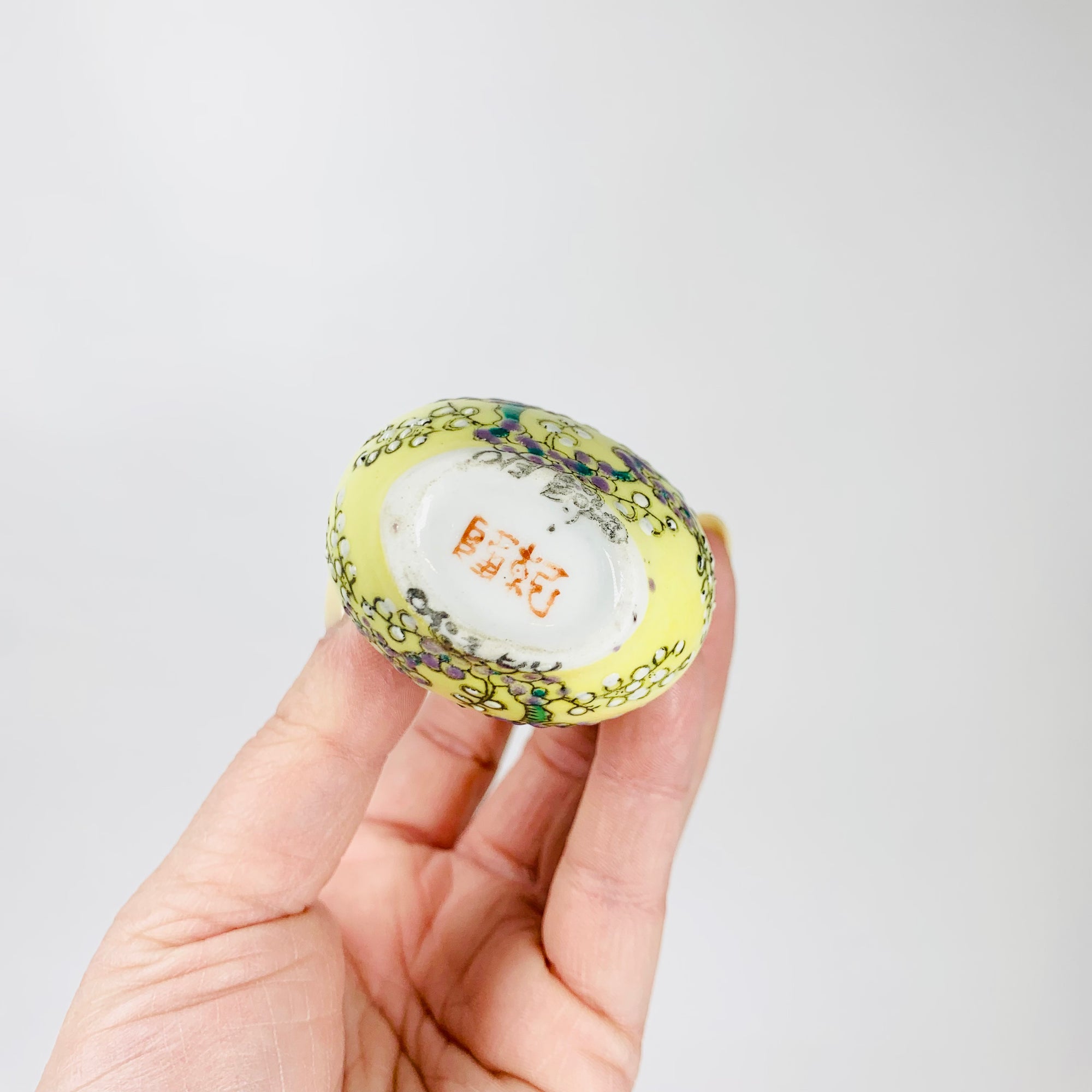 Antique Chinese hand painted yellow porcelain snuff bottle with jade stopper