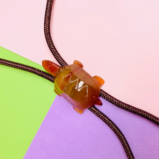 Extremely rare Midcentury Chinese red agate turtle bolo tie