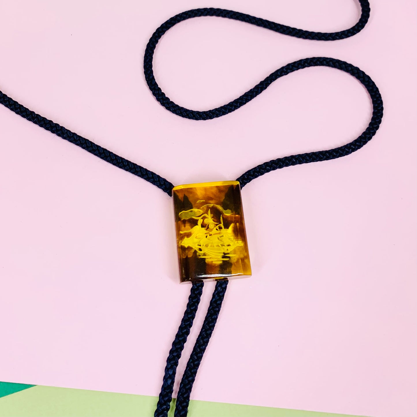Extremely rare Midcentury Chinese carved amber bolo tie