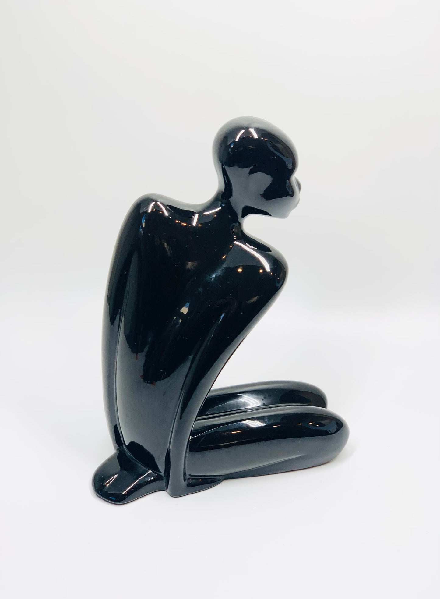 Midcentury black porcelain figurine