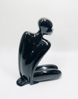 Midcentury black porcelain figurine