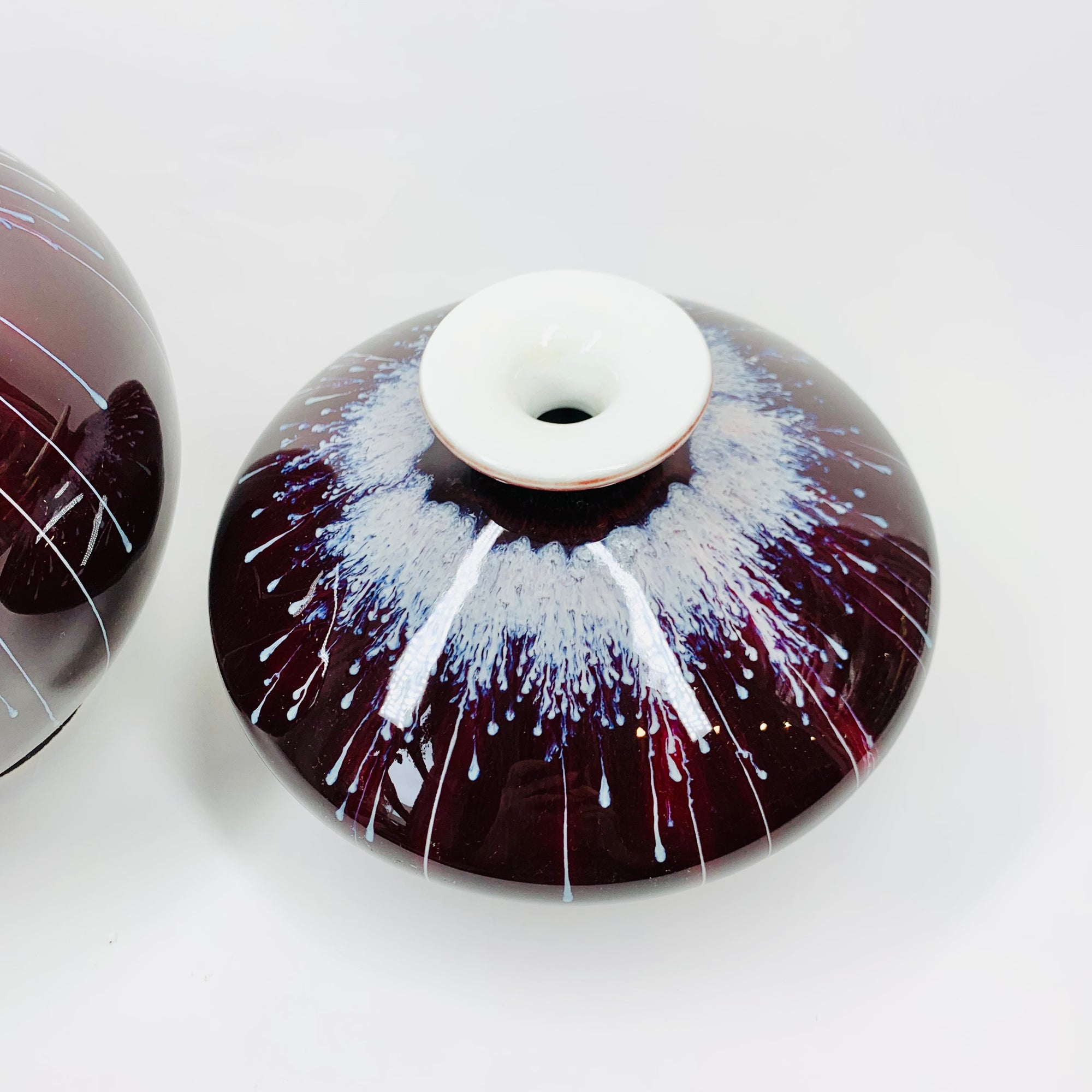 Vintage Chinese maroon bleed flambé pottery squat vase