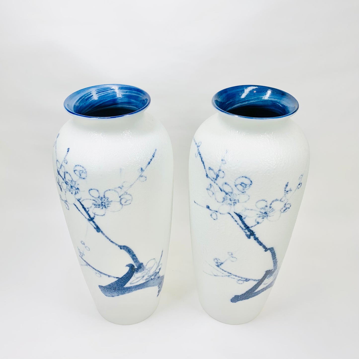 Midcentury hand painted Japanese white porcelain vase with blue sakura