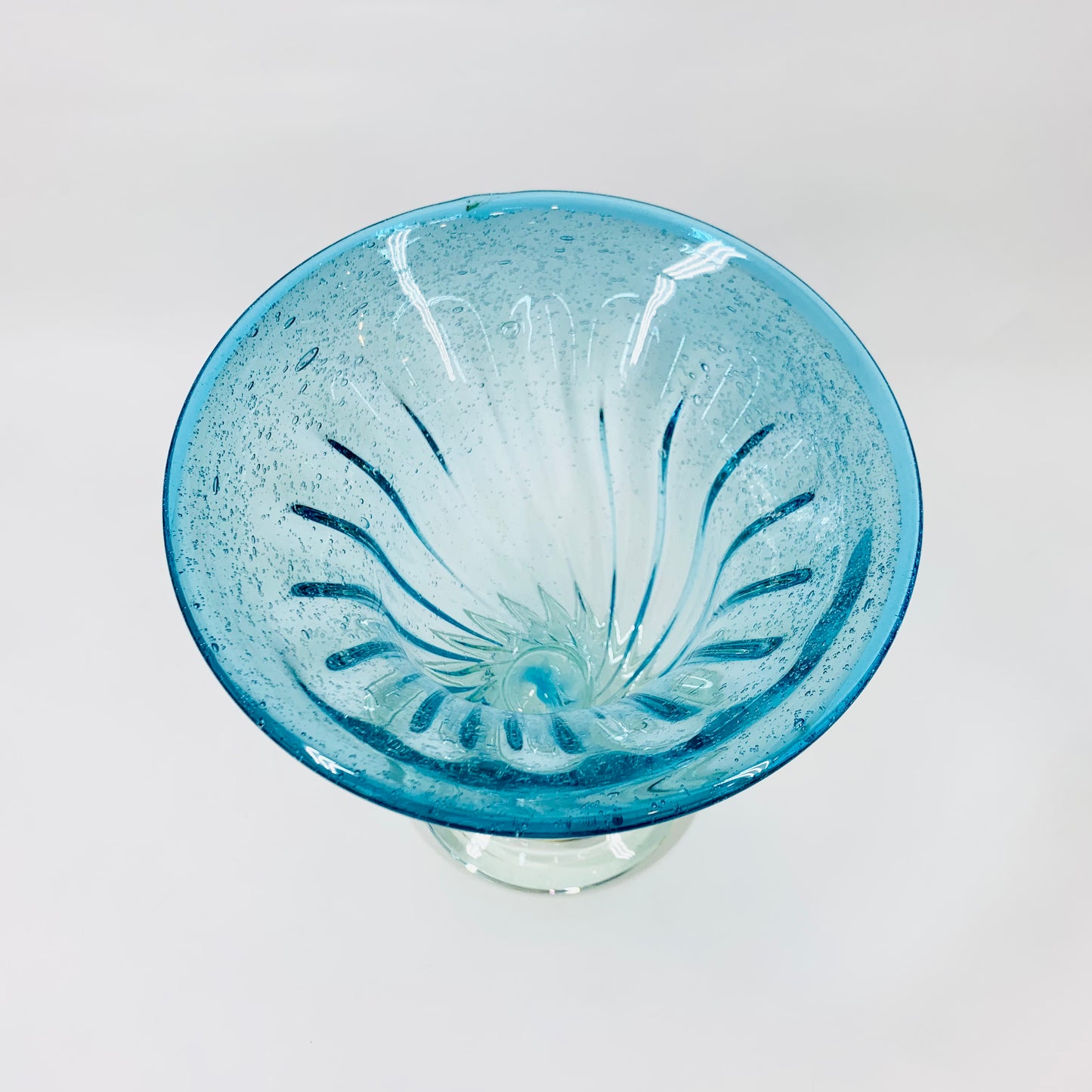 Midcentury mouth blown blue footed glass vase with controlled bubbles