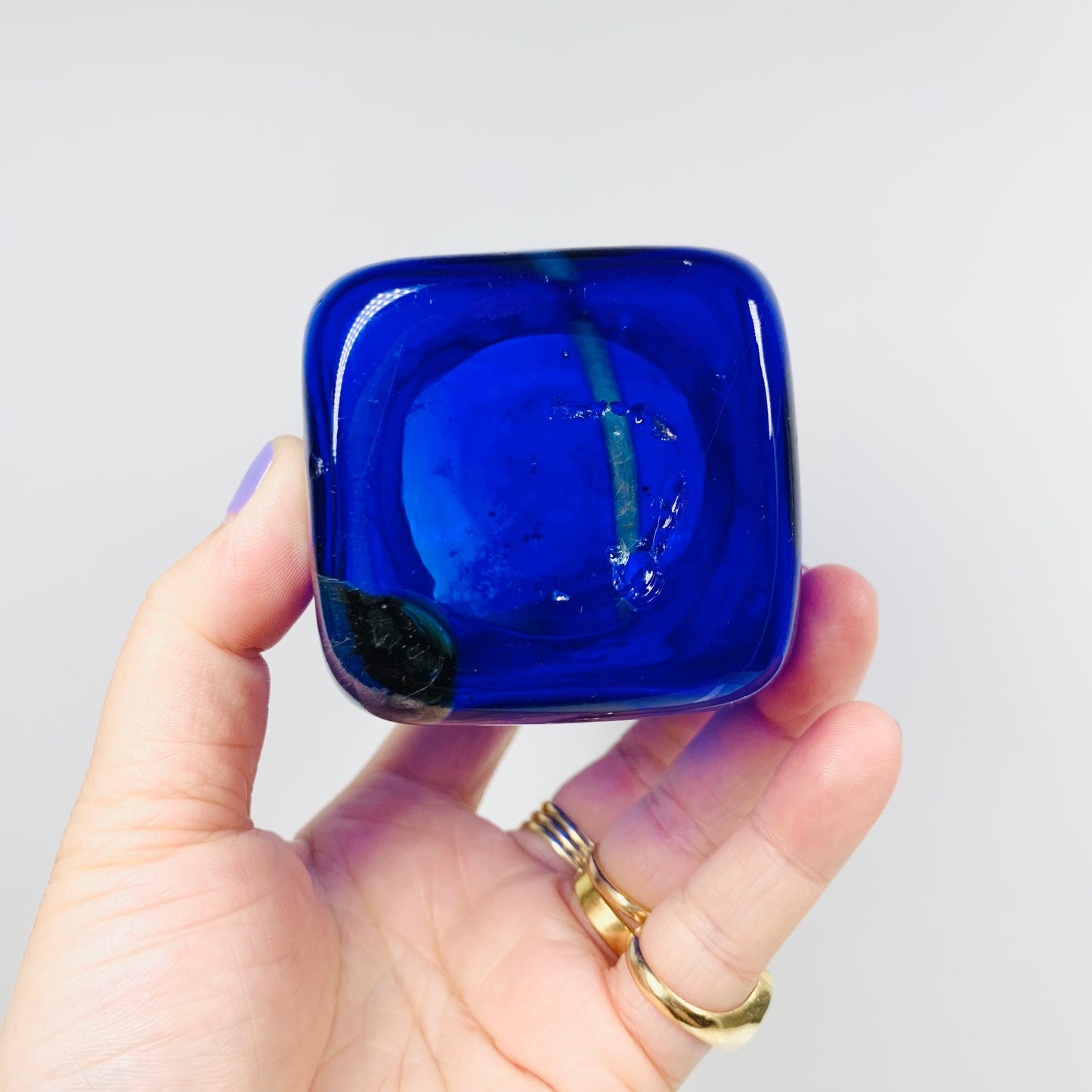 1980s Australian studio mouth blown cobalt blue glass mini vase with iridescent splash design