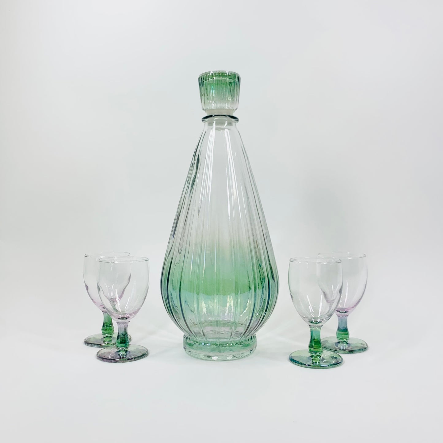 Extremely rare Midcentury American iridescent harlequin pressed glass decanter and matching glasses set