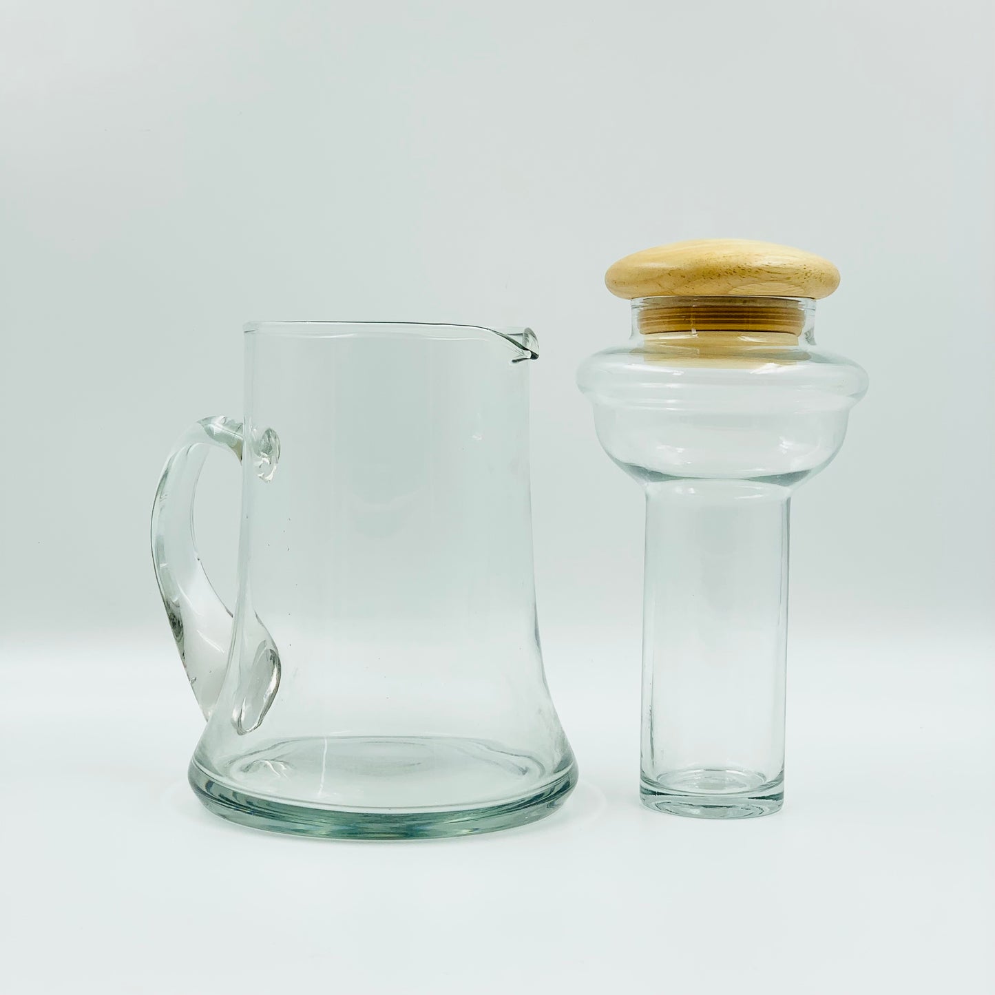 Retro hand blown Scandinavian clear glass pitcher with separate ice component