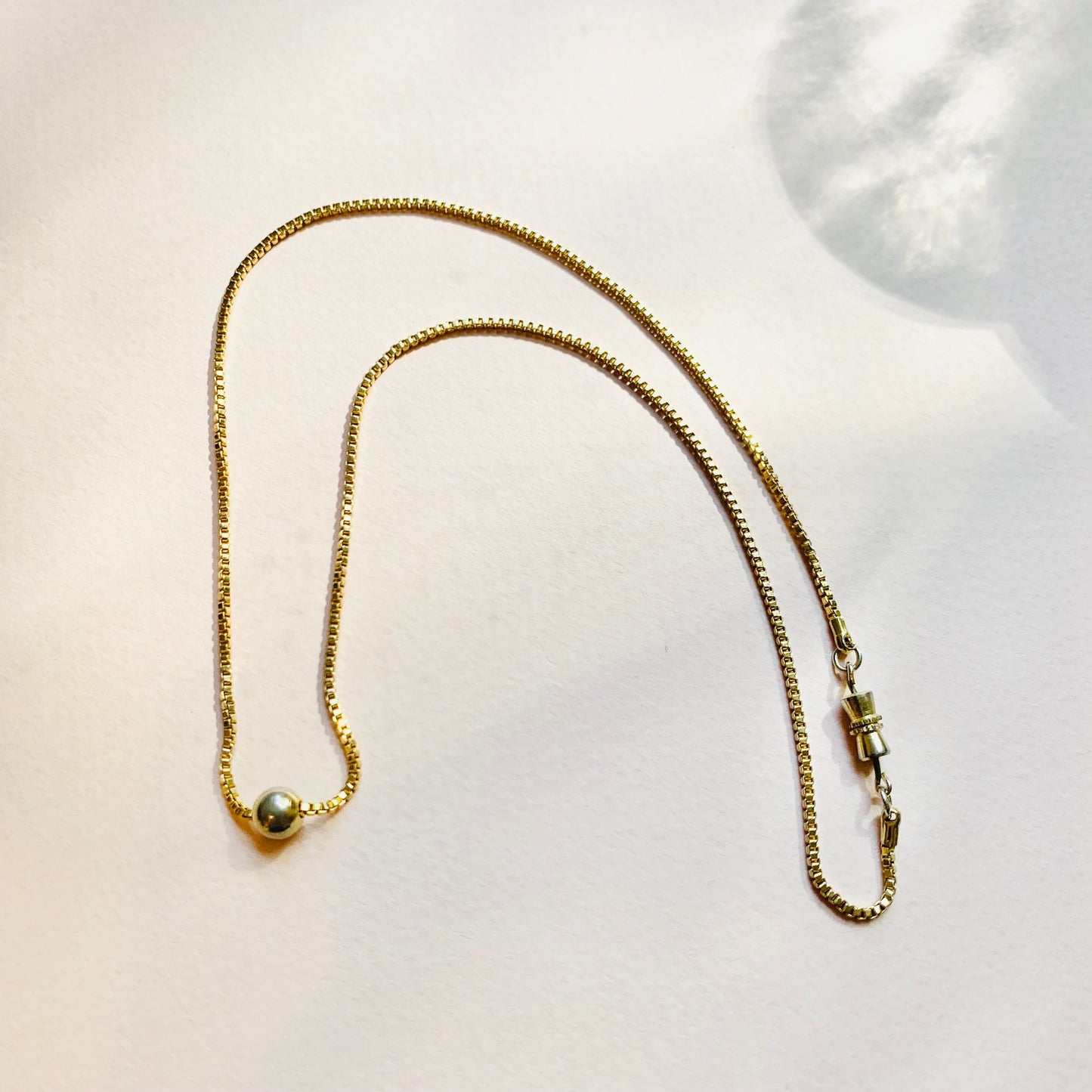 1970s Anson American triple plated gold necklace with ball pendant