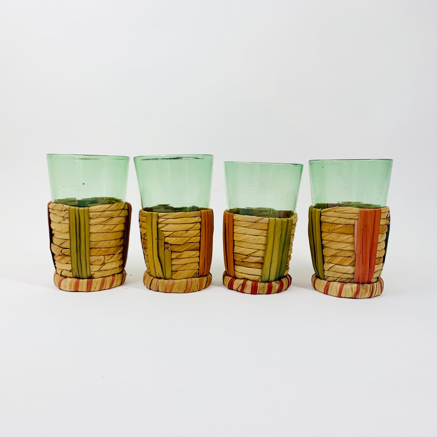 Midcentury hand made Italian green glass with detachable weaved sleeves