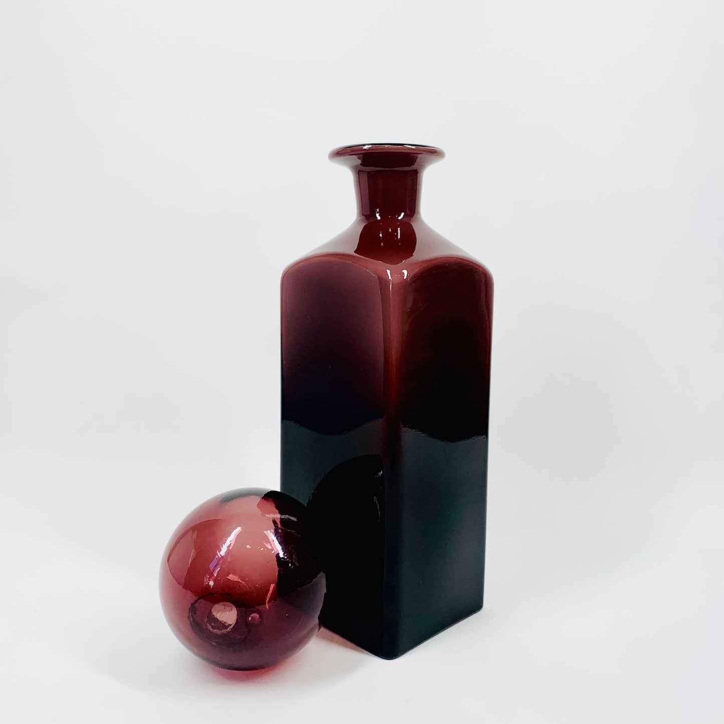 MCM Swedish cased amethyst glass bottle vase with ball stopper
