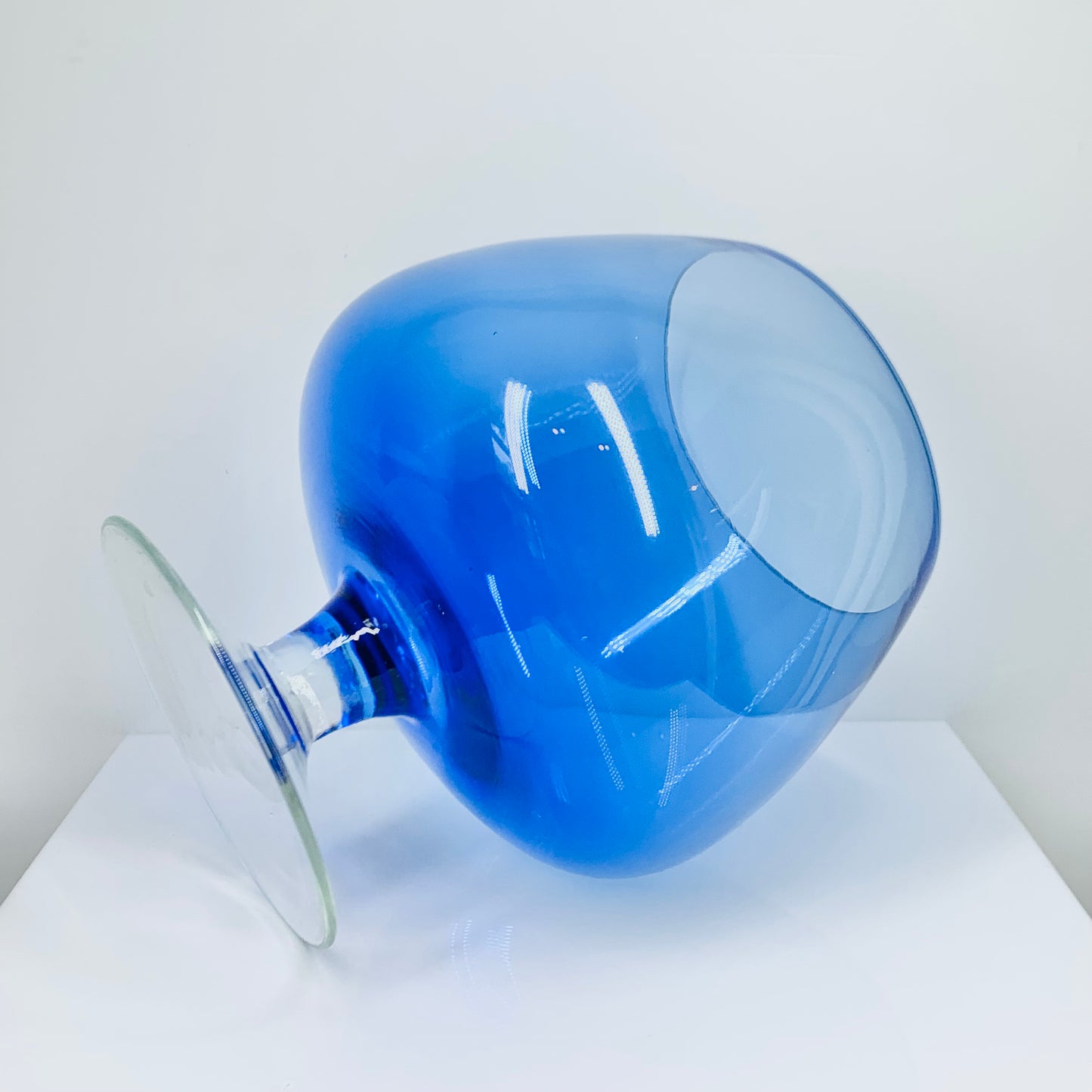 Large Midcentury Italian blue glass brandy balloon vase with clear stem
