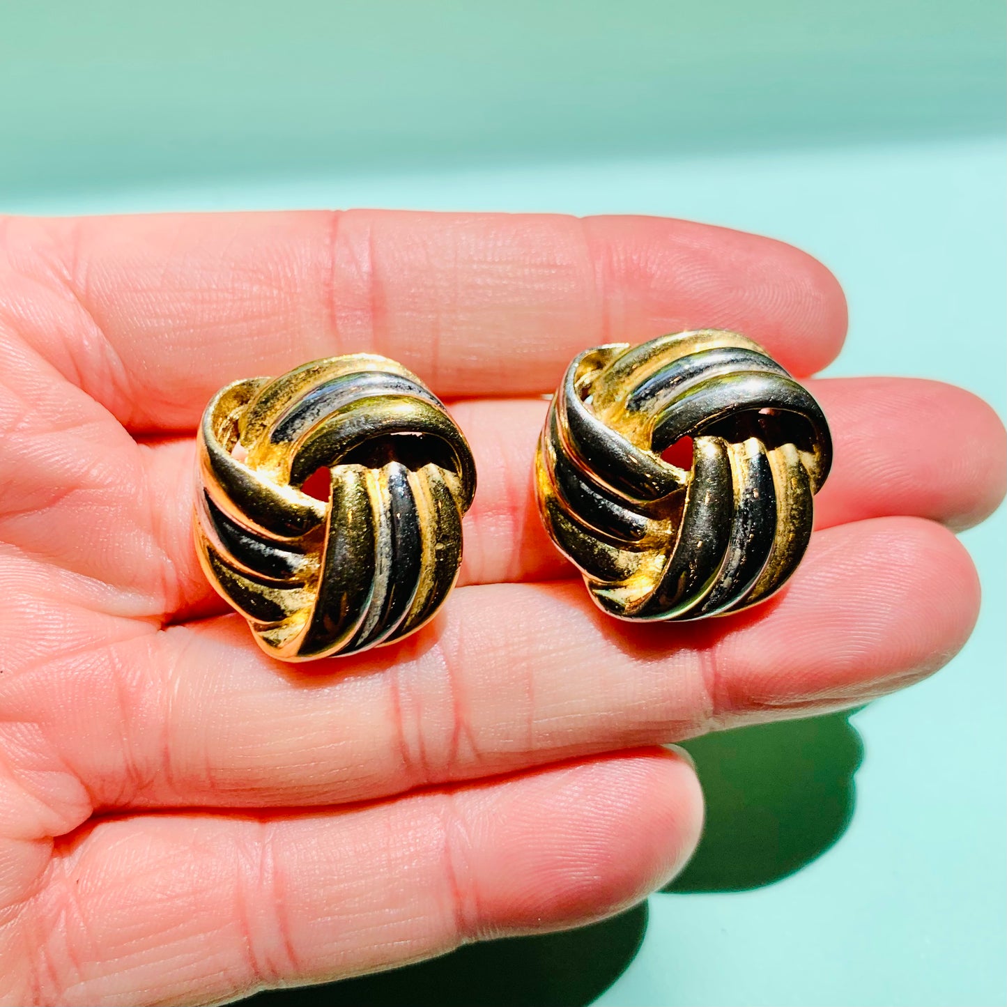 1960s Trifari gold plated two tone knot clip on earrings